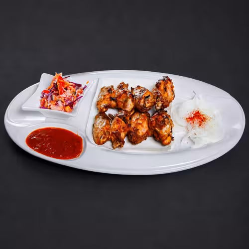 Marjon Milliy Taomlar КУРИНЫЕ КРЫЛЫШКИ фото блюда в меню