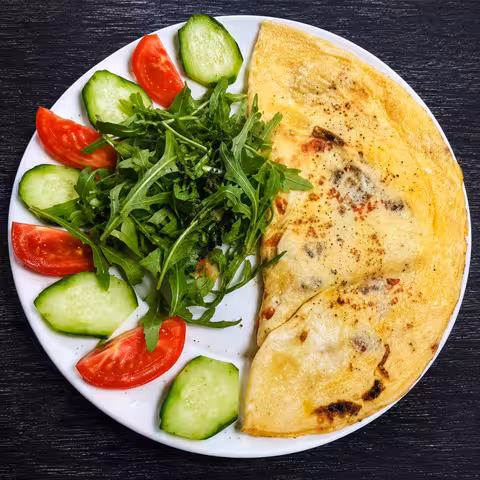 Marjon Milliy Taomlar ОМЛЕТ С ТУШЁНЫМ МЯСОМ фото блюда в меню